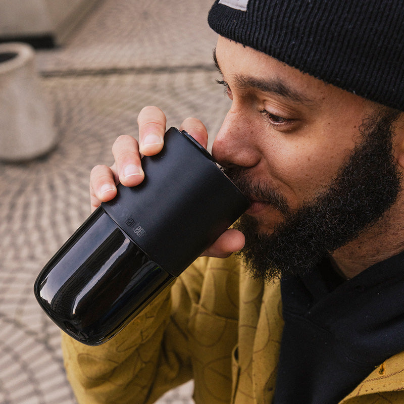 16oz-rise-tumbler-i7 16oz_rise_tumbler_black_man_drink_square.jpg