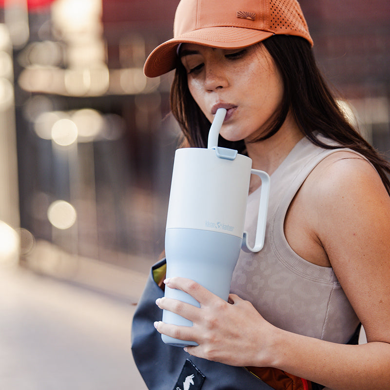 36oz-rise-tumbler-with-straw-lid-h6 36oz_rise_tumbler_straw_girl_sip_square.jpg